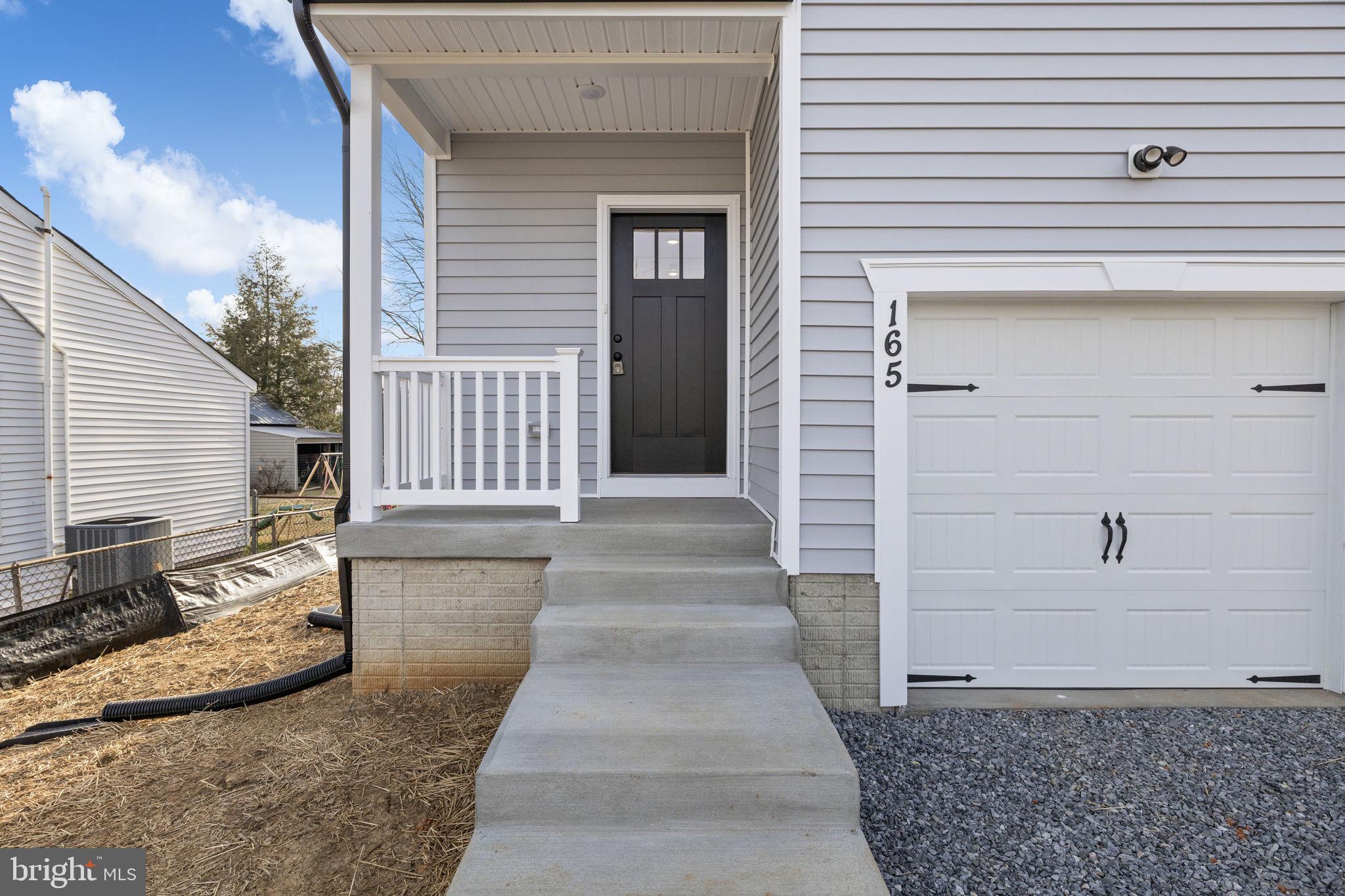 165 Bend Farm Road Fredericksburg, VA 22408 - Photo 47 of 51 a view of a entryway door front of house