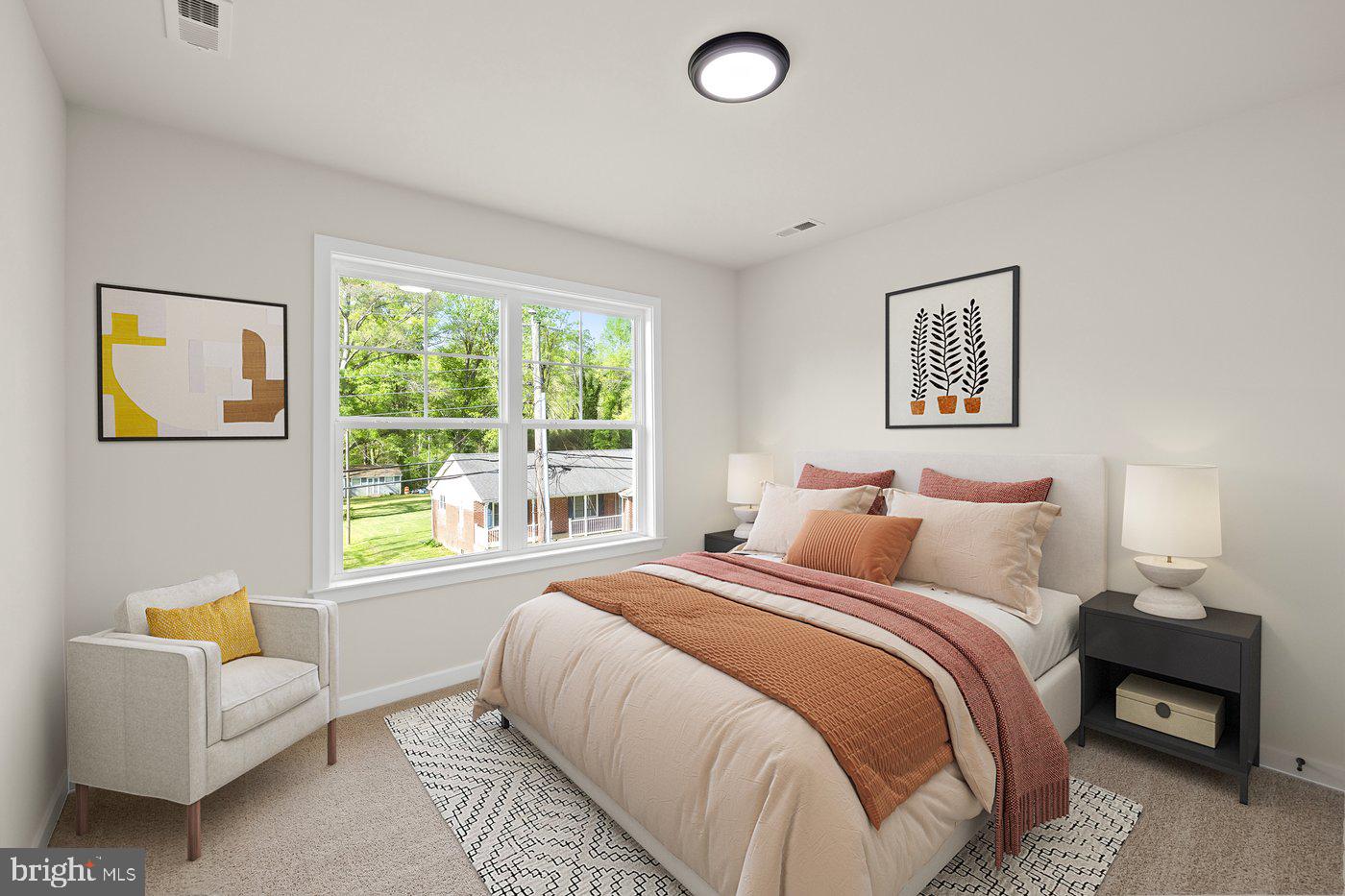 165 Bend Farm Road Fredericksburg, VA 22408 - Photo 5 of 51 a bedroom with a bed and a couch