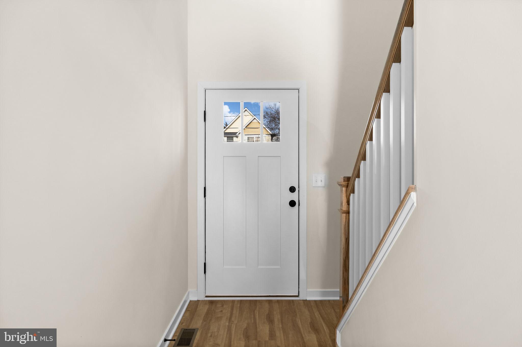 165 Bend Farm Road Fredericksburg, VA 22408 - Photo 10 of 51 a view of a hallway with wooden floor and entryway