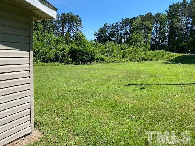 122 Bill Spain Road Henderson, NC 27537 - Photo 11 of 14 a view of a field with an outdoor space