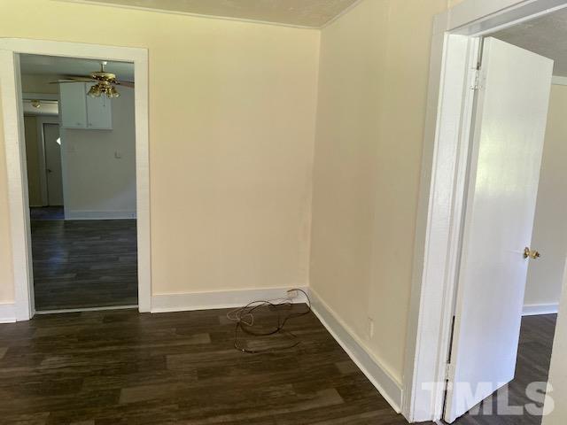 122 Bill Spain Road Henderson, NC 27537 - Photo 3 of 14 a view of a hallway with wooden floor and staircase