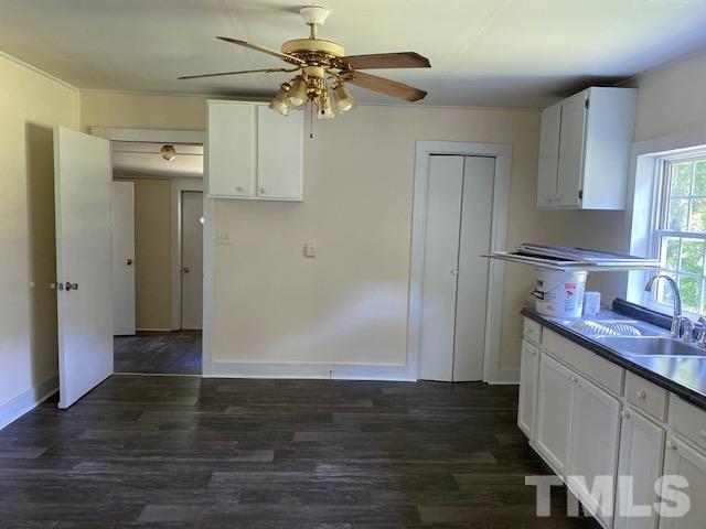 122 Bill Spain Road Henderson, NC 27537 - Photo 7 of 14 a view of a kitchen with a sink and dishwasher