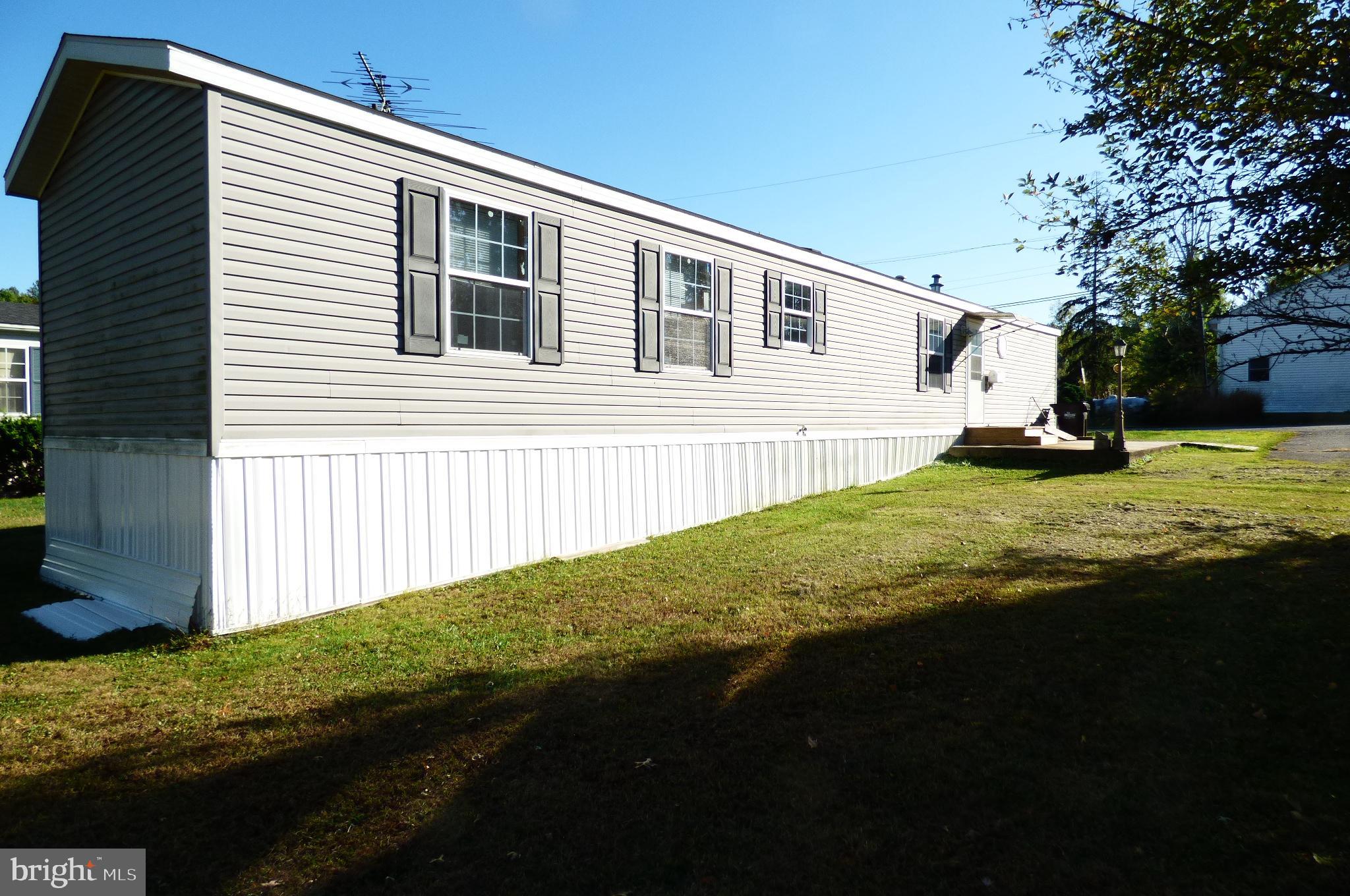 570 Layfield Road, Unit A Perkiomenville, PA 18074 - Photo 2 of 7 Charming mobile home with spacious yard.