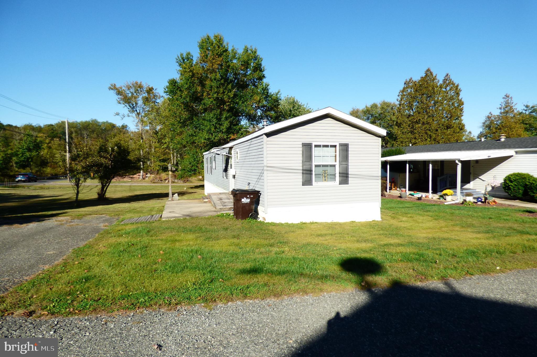 570 Layfield Road, Unit A Perkiomenville, PA 18074 - Photo 3 of 7 Charming home nestled in serene surroundings.