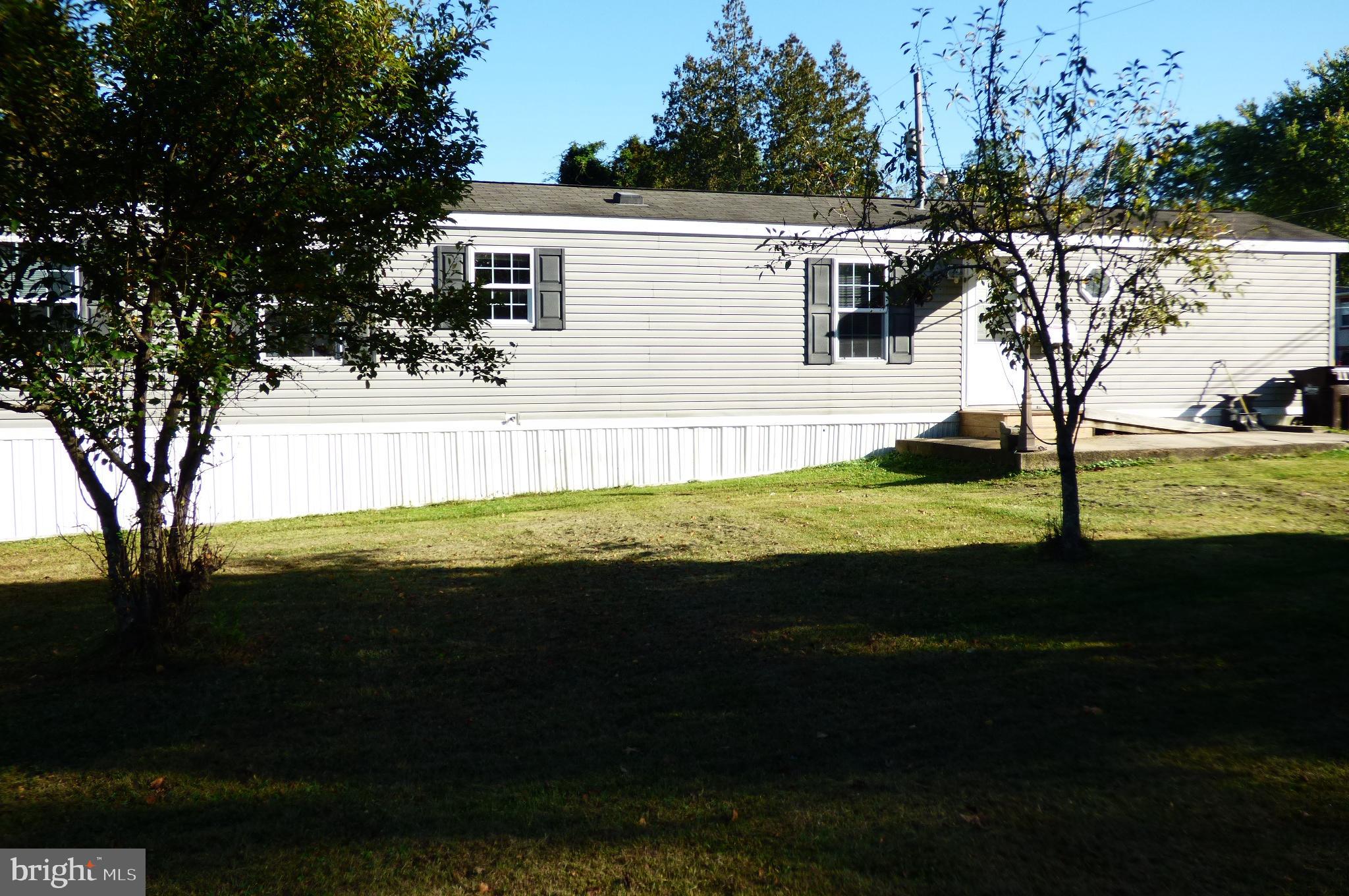 570 Layfield Road, Unit A Perkiomenville, PA 18074 - Photo 4 of 7 Charming home nestled in a serene landscape.