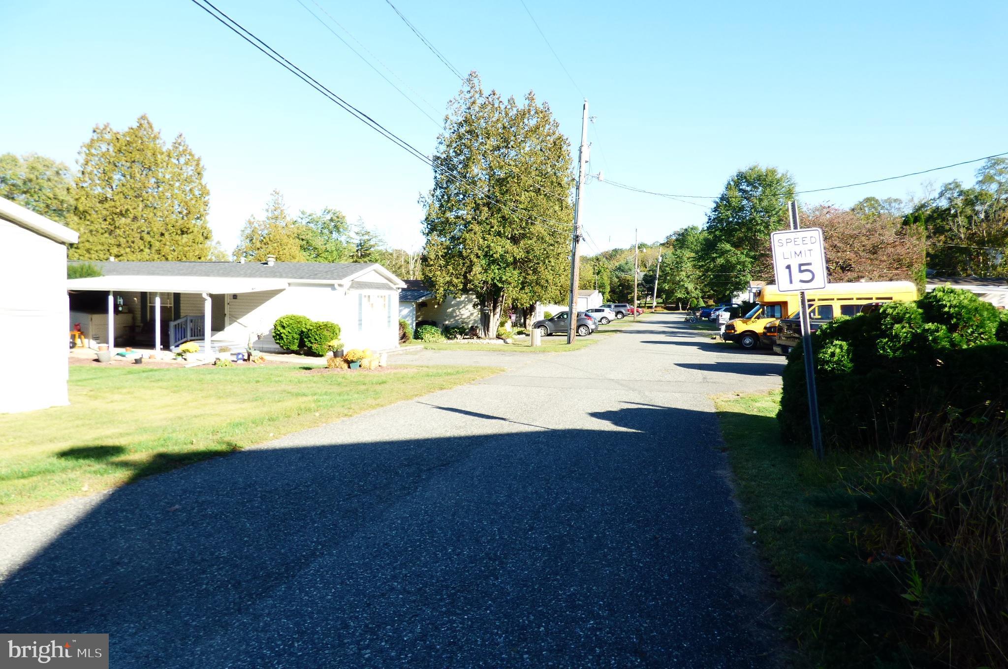 570 Layfield Road, Unit A Perkiomenville, PA 18074 - Photo 7 of 7 Quiet street lined with trees and homes.