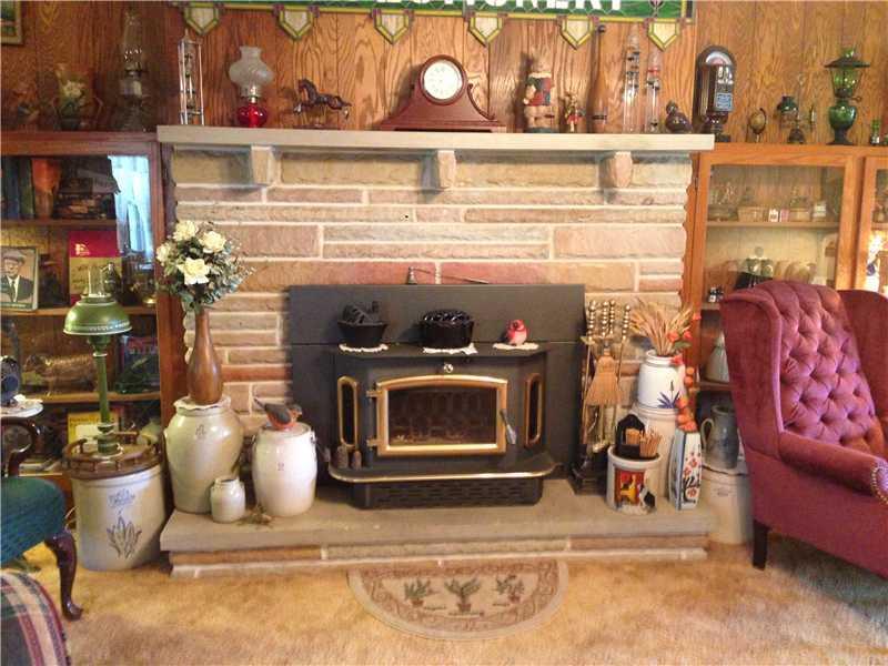 555 South Keel Ridge Road Hermitage, PA 16148 - Photo 4 of 21 Living Room. Wood Burning Fireplace does have gas line which can be reconnected.