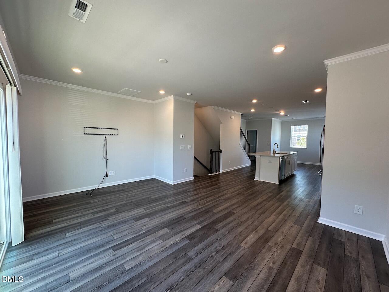 2521 Laurel Valley Way Raleigh, NC 27604 - Photo 8 of 25 a view of empty room with wooden floor