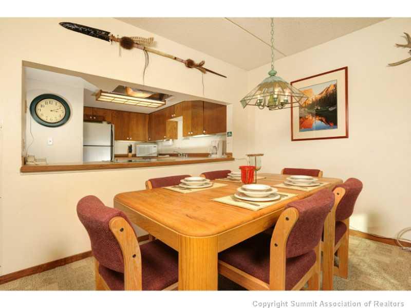 800 Copper Road, Unit 285 Copper Mountain, CO 80443 - Photo 6 of 17 a dining room with a table and chairs