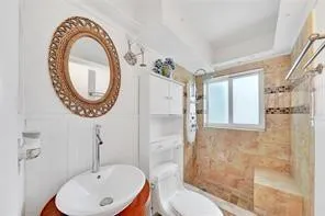 an empty room with a bathroom