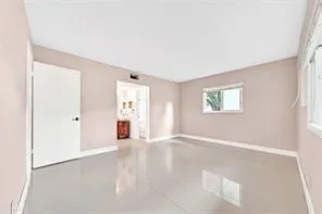 a bathroom with a toilet and a bathtub