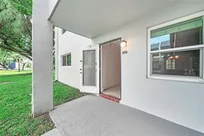 a view of a balcony and an outdoor seating