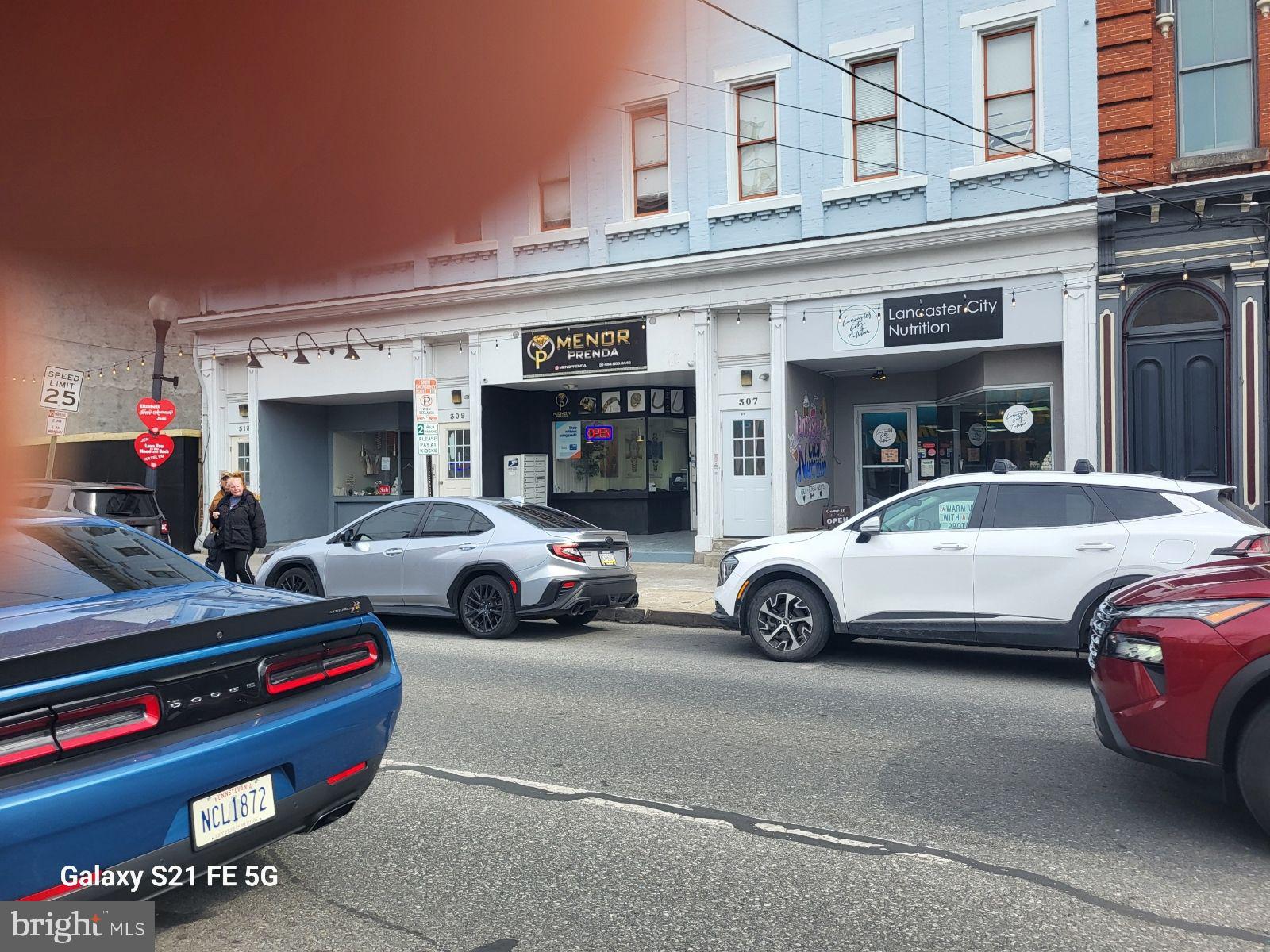 a view of a cars parked in front of a building