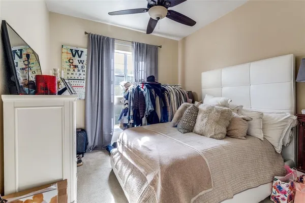 a bedroom with a bed and a walk in closet