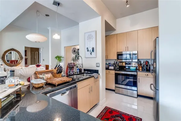 a living room with furniture and a stove