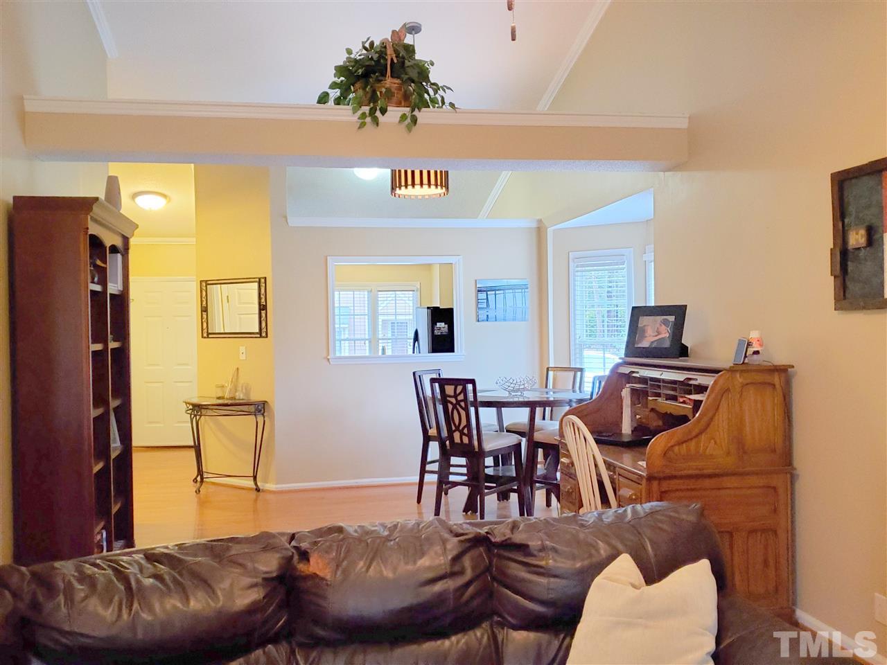 3801 Axle Lane Raleigh, NC 27616 - Photo 14 of 21 a living room with furniture and a window