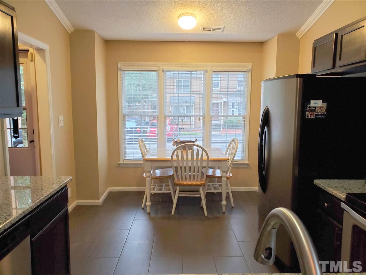 3801 Axle Lane Raleigh, NC 27616 - Photo 8 of 21 a dining room with furniture and window