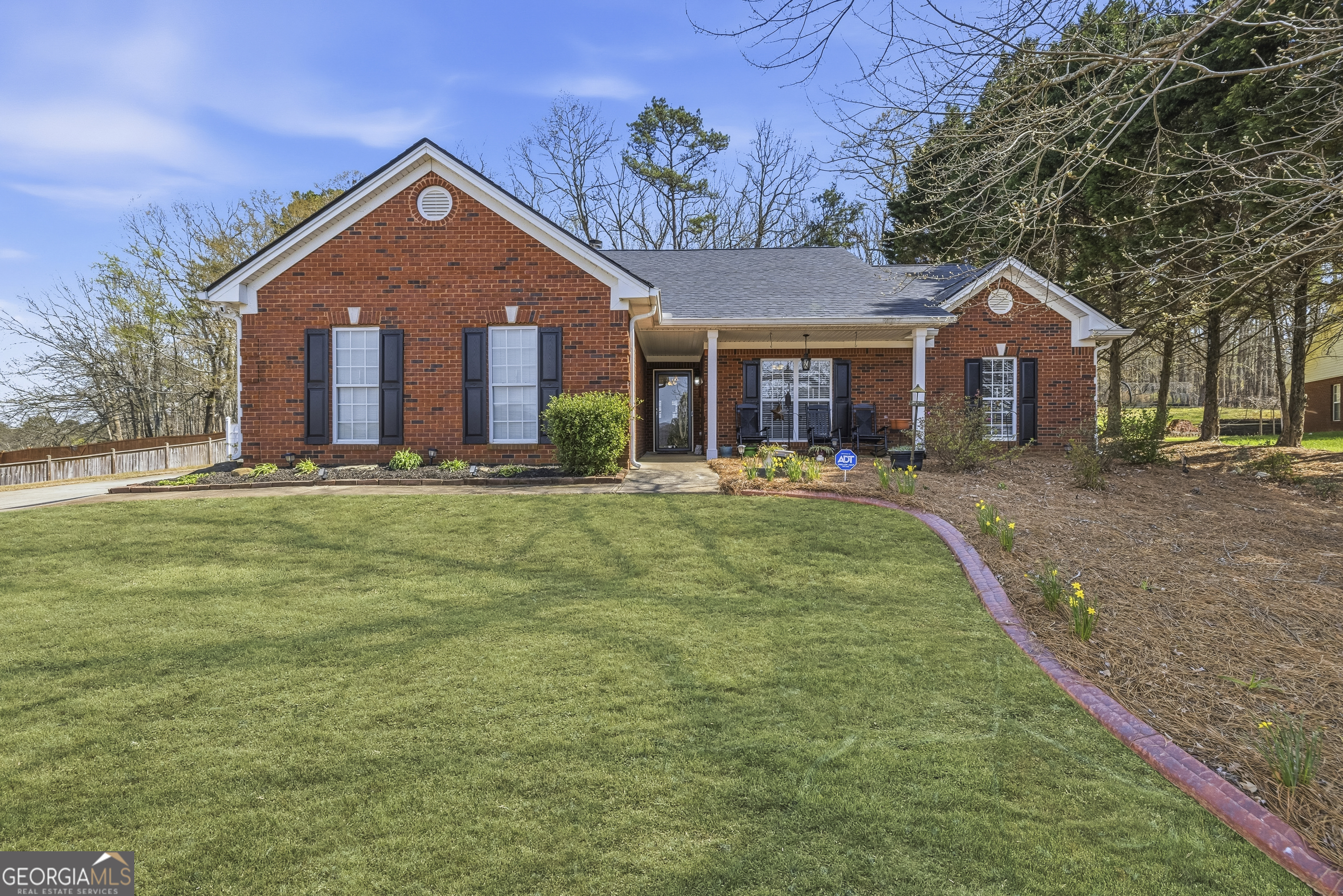 460 Flyway Lane Winder, GA 30680 - Photo 2 of 32 a front view of a house with a yard