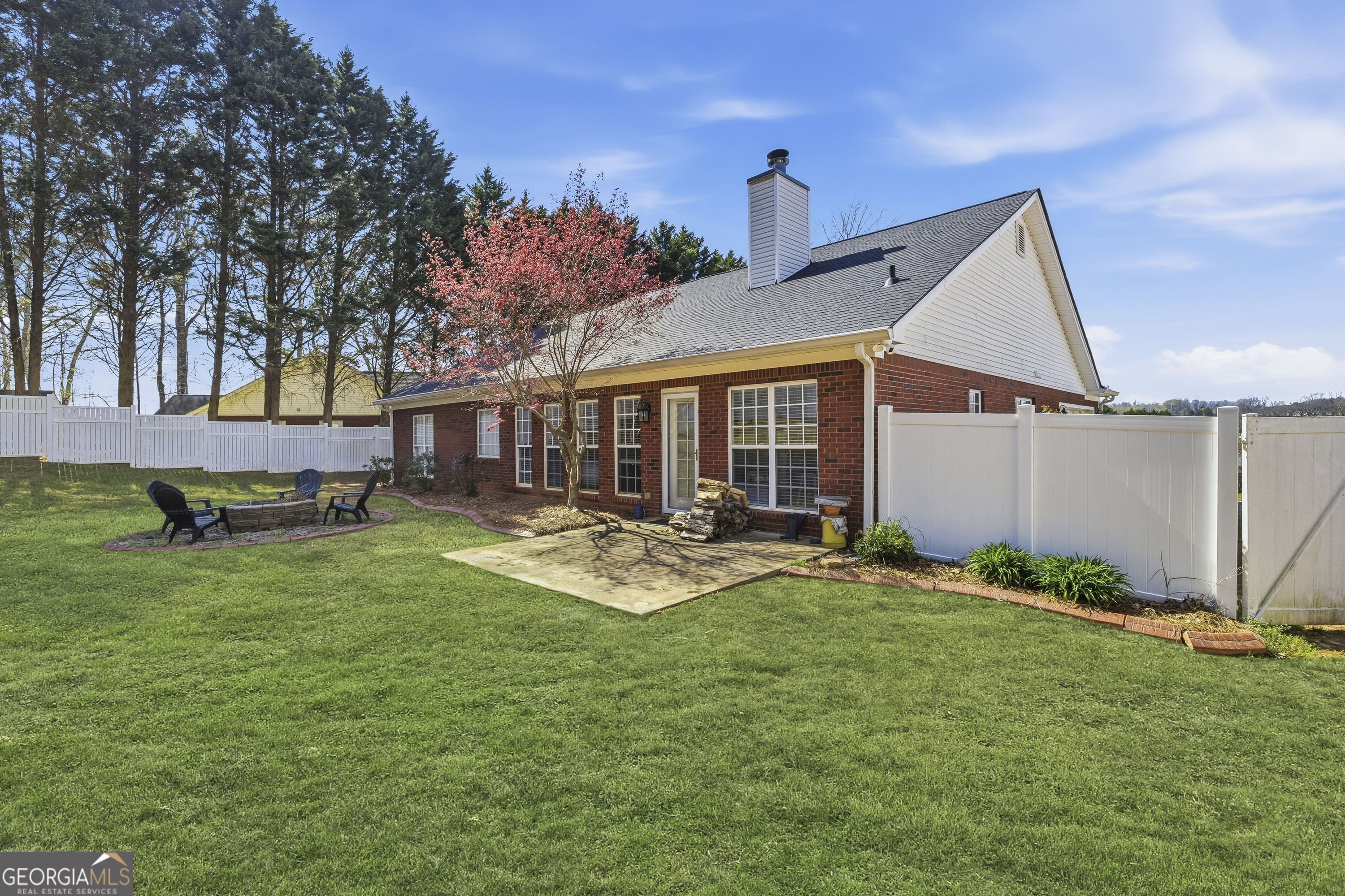 460 Flyway Lane Winder, GA 30680 - Photo 25 of 32 a view of a house with a yard and sitting area