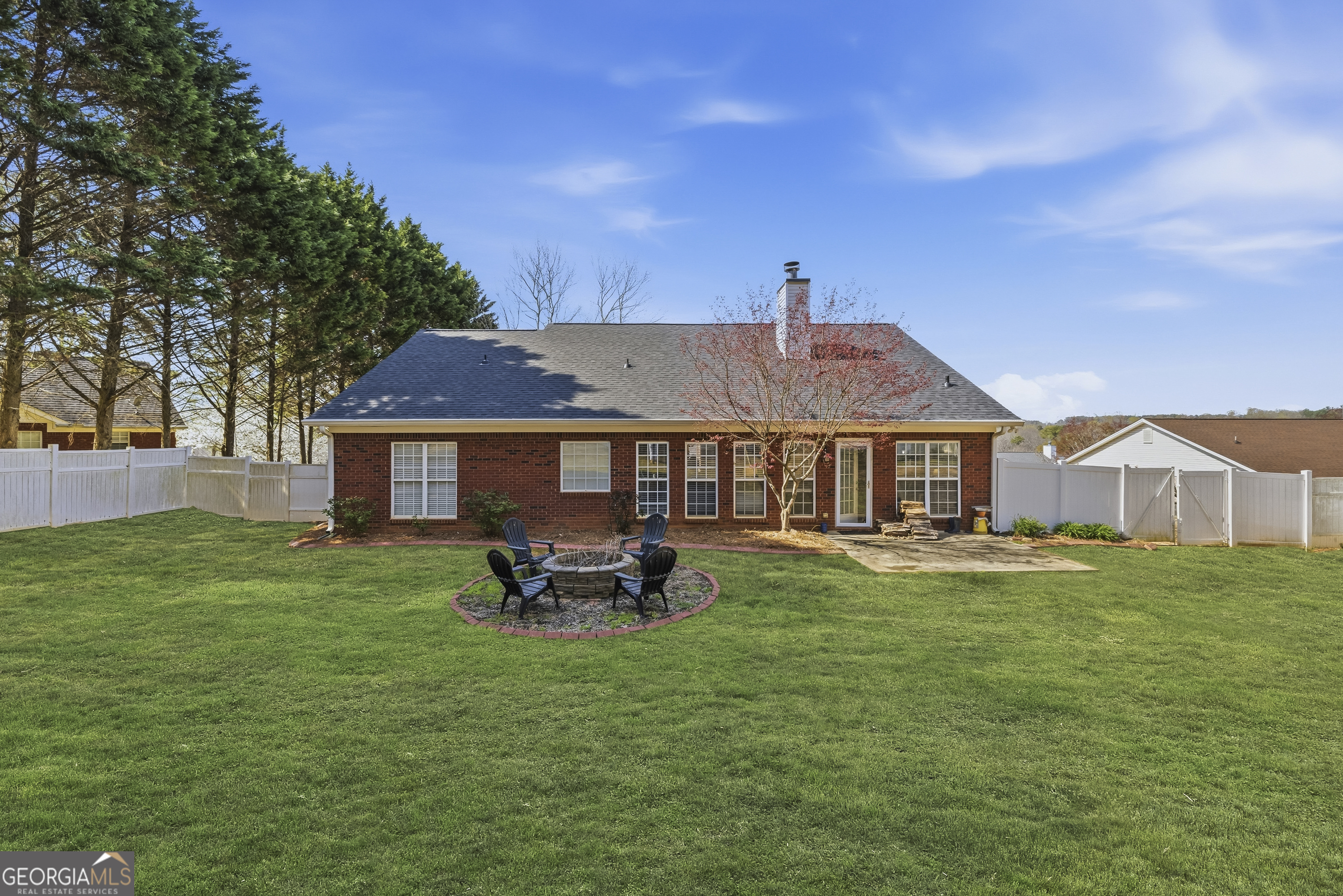 460 Flyway Lane Winder, GA 30680 - Photo 27 of 32 a front view of a house with garden