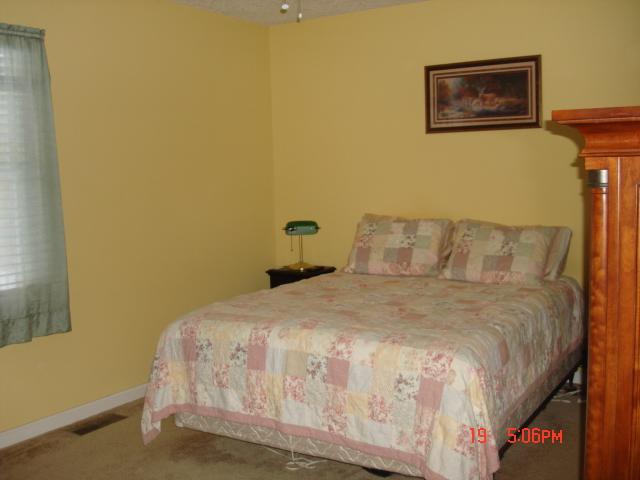 2502 Poteet Road Hardy, VA 24101 - Photo 5 of 19 a bedroom with a bed and a wall painting