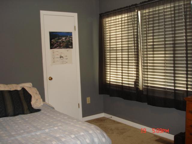 2502 Poteet Road Hardy, VA 24101 - Photo 8 of 19 a bedroom with a bed and a window