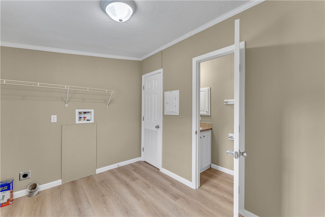 12082 State Highway Walton, NY 13856 - Photo 21 of 28 Laundry room with full size washer/dryer hookup and 1/2 bath