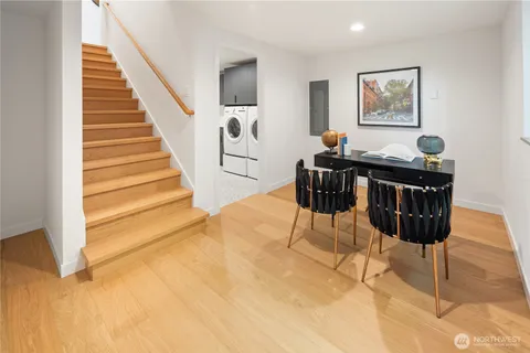 a view of a livingroom with furniture and wooden floor