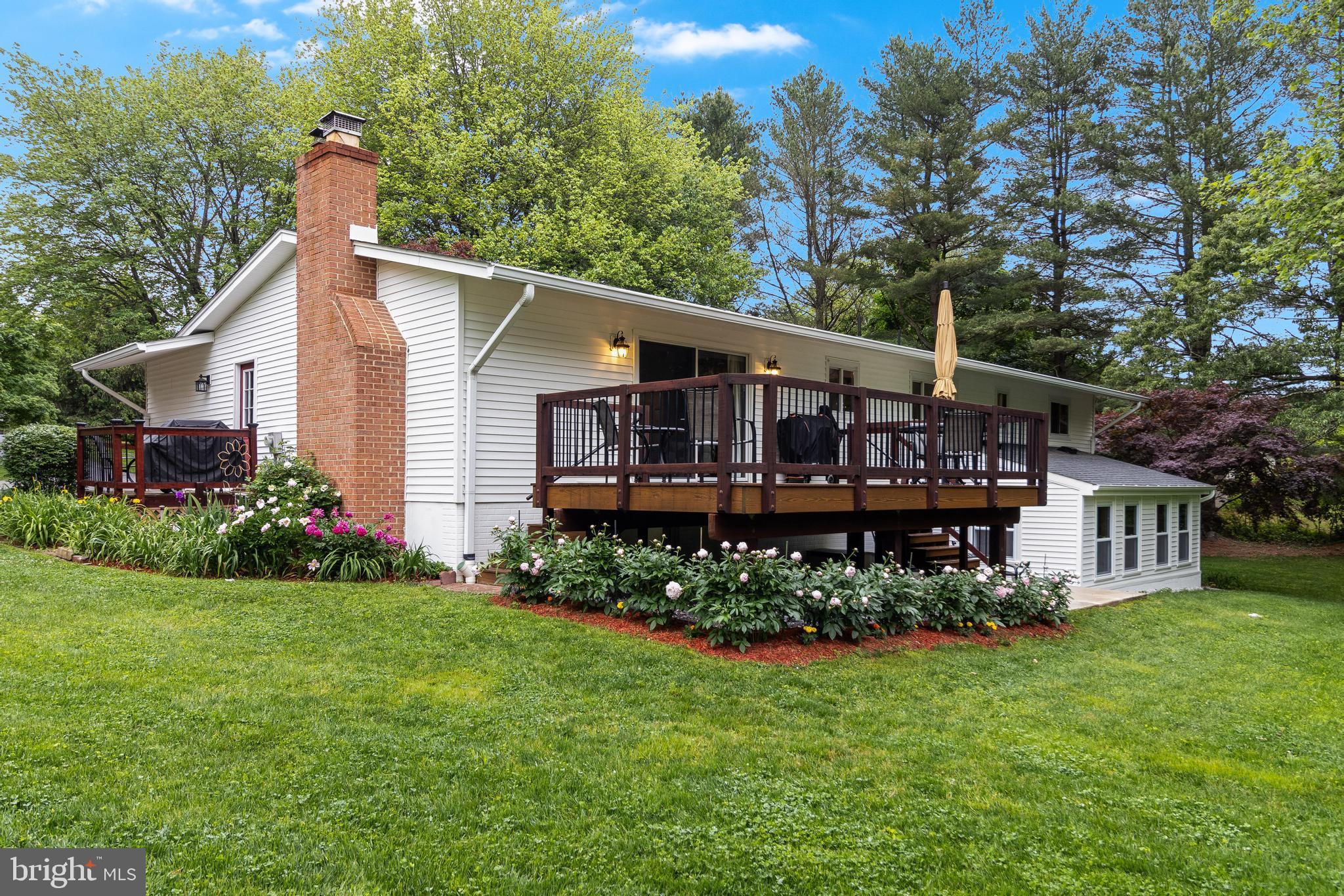 2012 Smoky Road Huntingtown, MD 20639 - Photo 21 of 54 a view of a house with garden