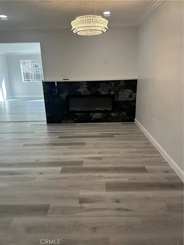 a kitchen with a sink stainless steel appliances and cabinets