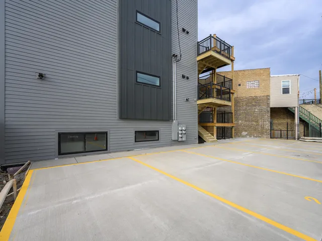 a view of a building with a street