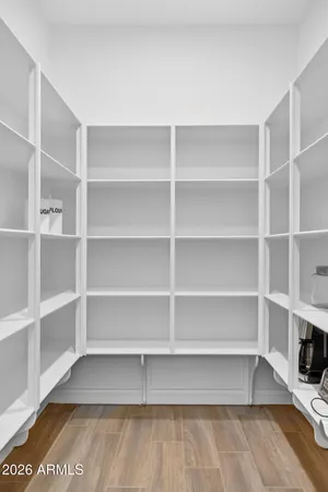 a bathroom with a sink double vanity and a mirror