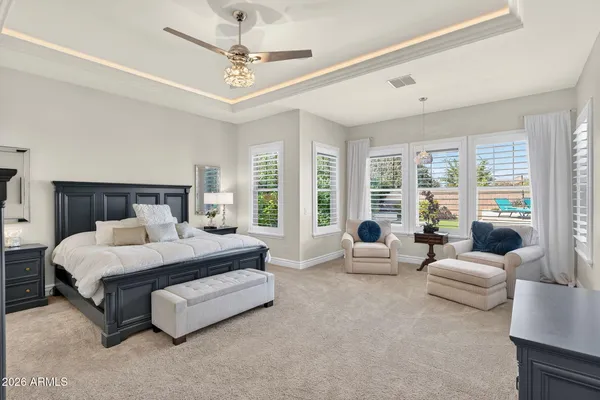 a bedroom with bed and window