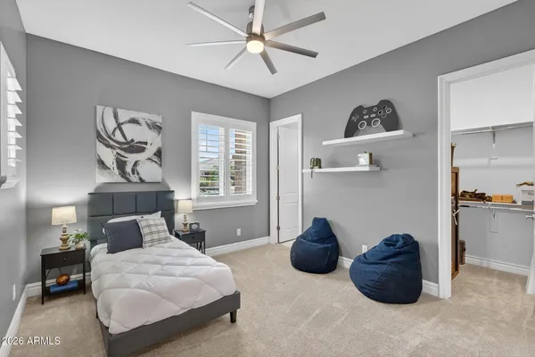 a view of a swimming pool with an outdoor space and seating area