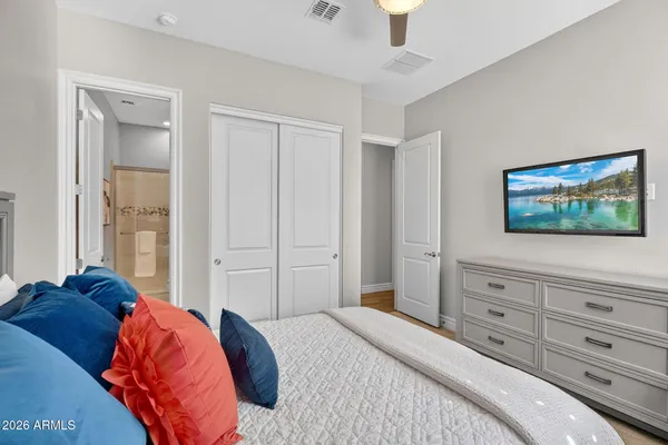 a view of a house with backyard sitting area and garden