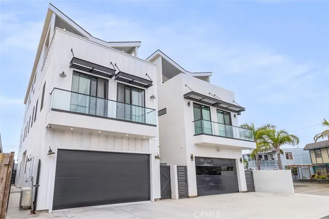 a front view of a house with a garage