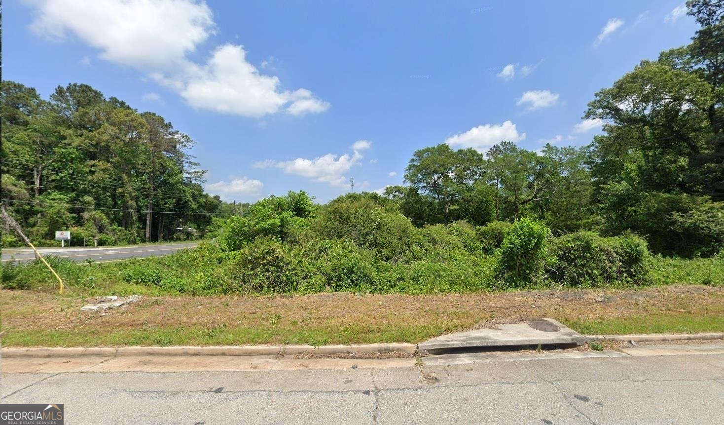 4655 Jackybell Trail Decatur, GA 30034 - Photo 1 of 1 a backyard of a house with a yard and garage