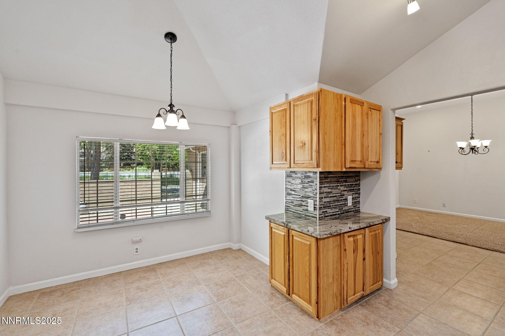 17860 South Virginia Street Reno, NV 89521 - Photo 15 of 46 a kitchen with stainless steel appliances granite countertop a stove and a sink