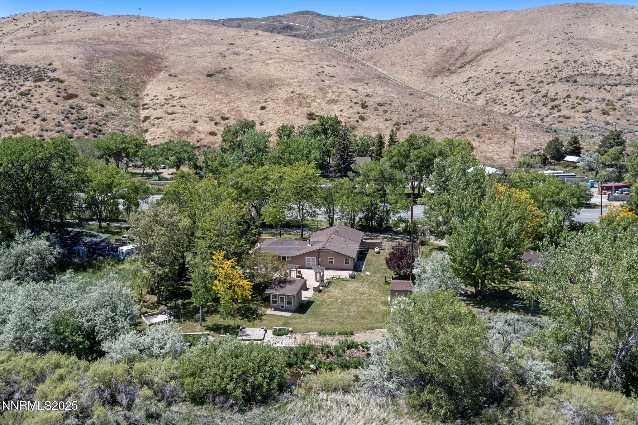 17860 South Virginia Street Reno, NV 89521 - Photo 5 of 46 an aerial view of a house with a yard