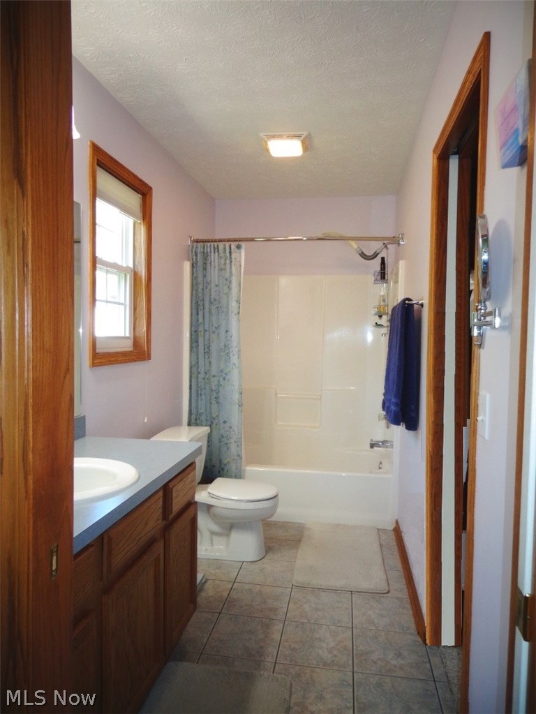 4158 Berkley Road Vermilion, OH 44089 - Photo 16 of 29 The Master Bath has ceramic tile flooring a tub/shower combination and a nice size walk-in closet.