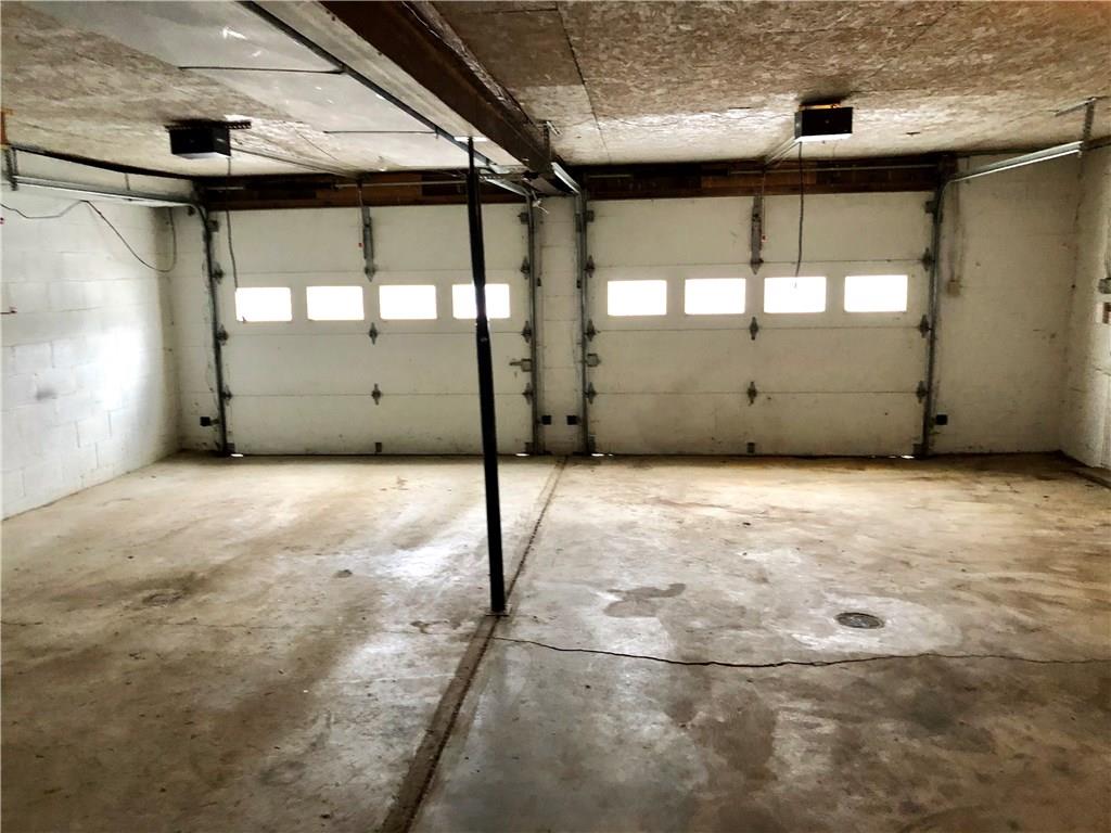 775 Beacom Drive Beaver, PA 15009 - Photo 14 of 15 2-car integral garage leading directly into the basement/lower level. Additional garage is to the left. Garage has side door leading to the rear yard and has plenty of room for storage.