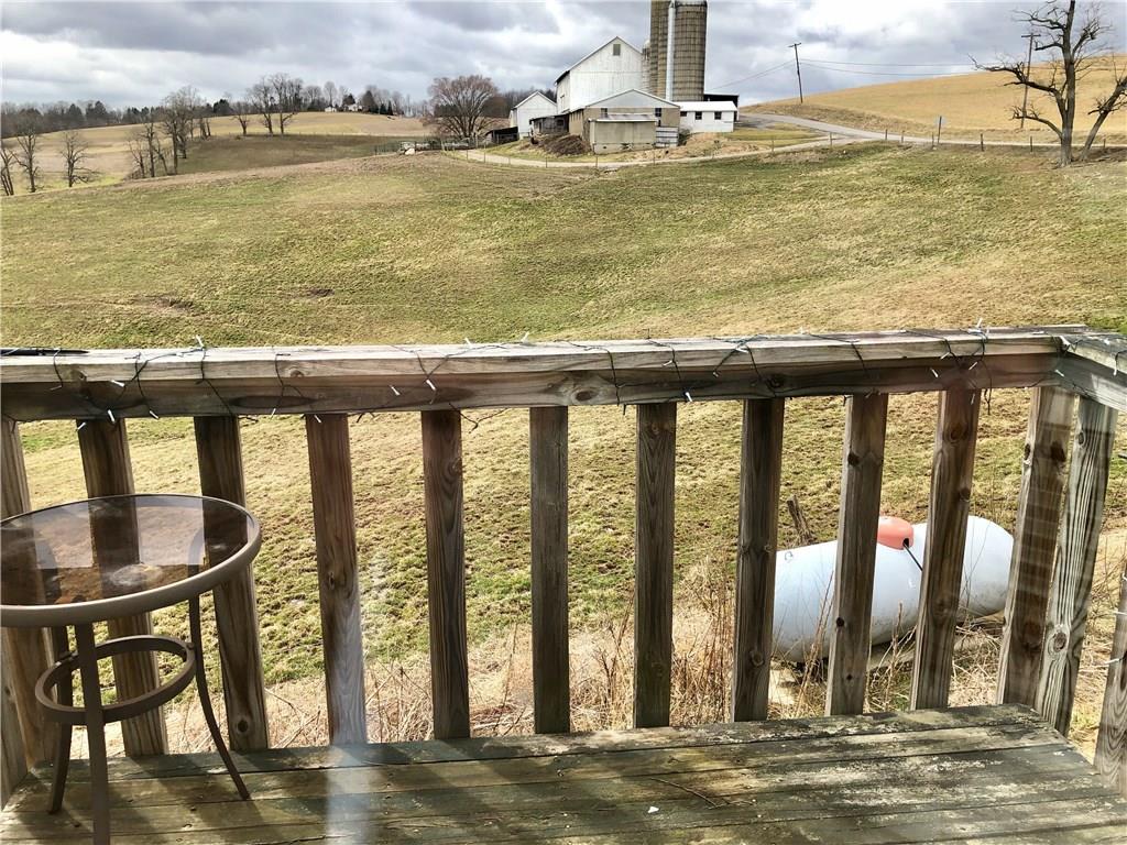 775 Beacom Drive Beaver, PA 15009 - Photo 6 of 15 The Private Master Deck has a wonderful view of the rolling Pennsylvania hills and the neighboring farm.