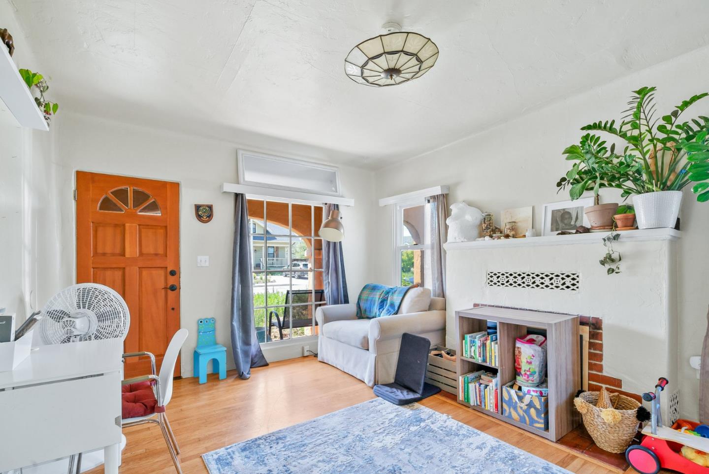 620 Sumner Street Santa Cruz, CA 95062 - Photo 36 of 45 a living room with furniture and a table