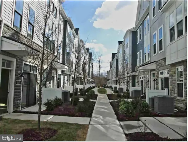 a view of a pathway both side of building