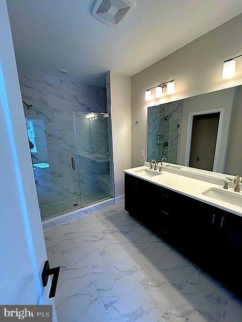 5105 Donatello Drive, Unit 541 Princeton, NJ 08540 - Photo 23 of 36 a spacious bathroom with a double vanity sink a toilet a mirror and shower