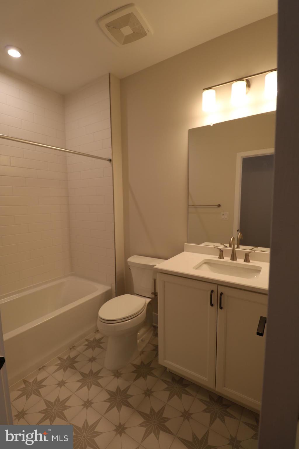 5105 Donatello Drive, Unit 541 Princeton, NJ 08540 - Photo 29 of 36 a bathroom with a sink a toilet and shower