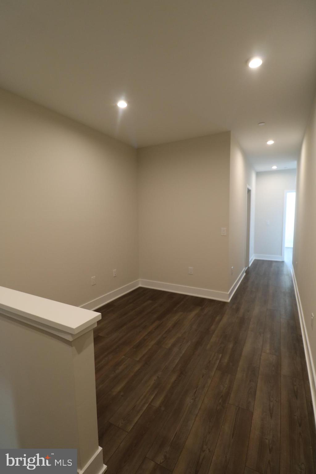 5105 Donatello Drive, Unit 541 Princeton, NJ 08540 - Photo 31 of 36 a view of hallway with wooden floor