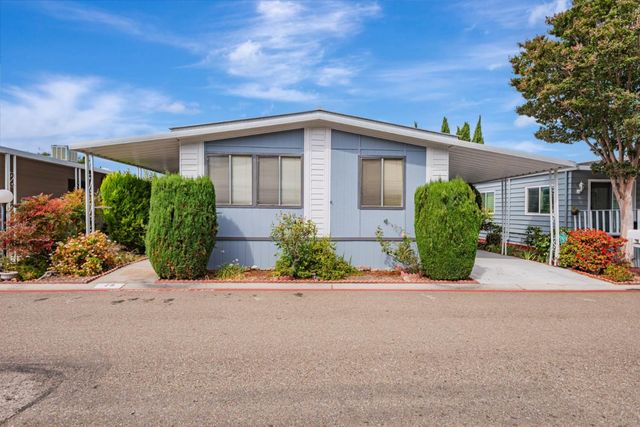 front view of a house with a street