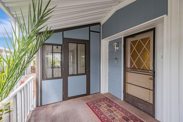 a view of an entryway with a rug