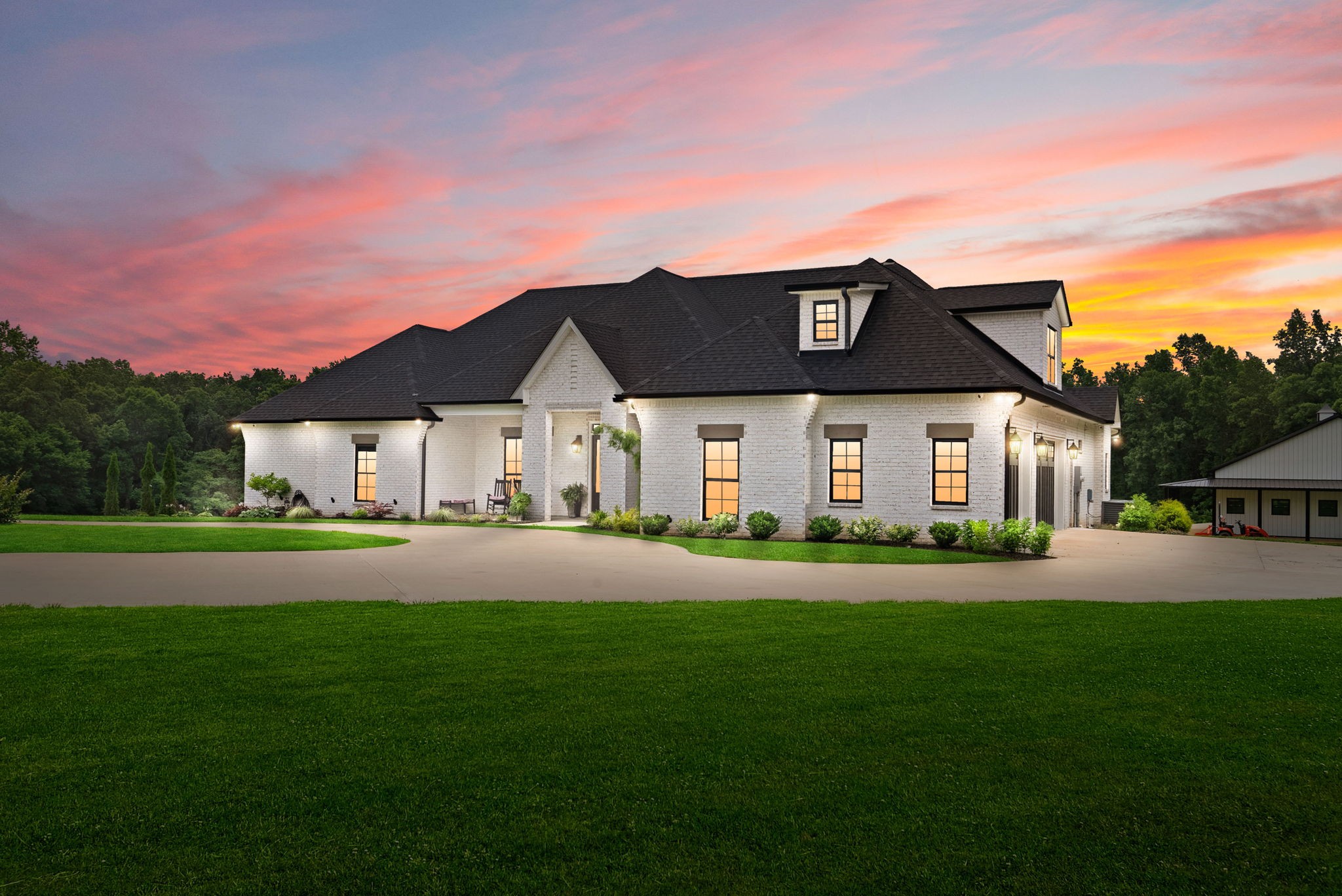 a front view of house with yard and green space